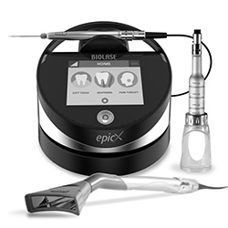 The image shows a dental hygiene product with a digital display and a toothbrush, accompanied by dental floss and a dental pick, all presented on a black surface with a clean background.