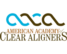The image displays a logo consisting of text and graphic elements. It features a stylized  A  with a curved line, followed by  ACA  in uppercase letters, and beneath that, the words  AMERICAN ACADEMY CLEAR ALIGNERS  in smaller font. To the right of the  A , there is an illustration of a tooth with clear aligners on it, showing a sequence of straightening. The logo also includes a graphic element resembling a wave or ripple above the text  ACA.