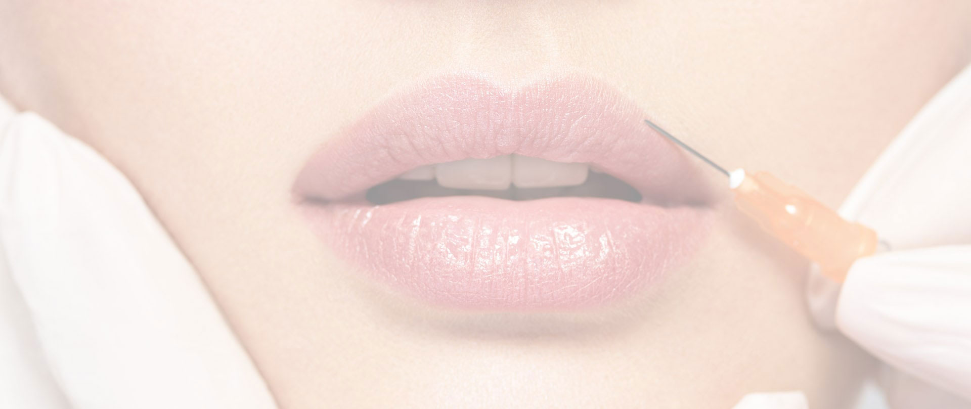 The image shows a close-up of a person s lips receiving cosmetic treatment, with a syringe containing a clear substance being injected into them.