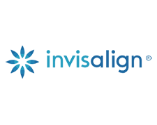 The image is a logo with text that reads  INVISALIGN,  which appears to be a brand name for an orthodontic treatment service, set against a dark background with a light blue color accentuating the text and a small, stylized graphic resembling a smile or teeth alignment.