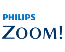 The image shows a logo with the text  Philips  followed by an exclamation mark above the word  Zoom   and below it, the word  BOOM   in bold letters. The background of the logo is white, and there is a graphic element resembling a magnifying glass or search icon to the left of the text.